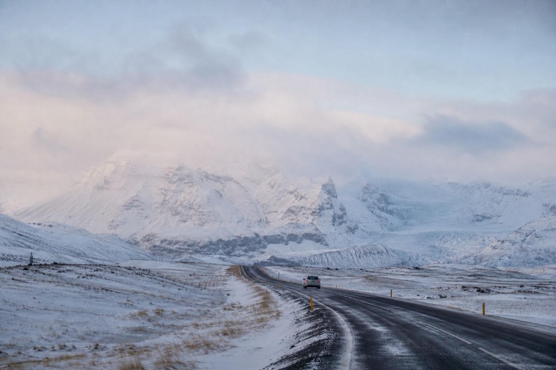 A South Coast winter road heading east toward the glaciers on a two-day Iceland package