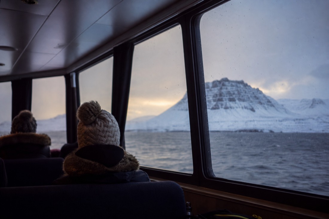 The heated indoor lounge of a Reykjavík whale watching boat on a winter sailing